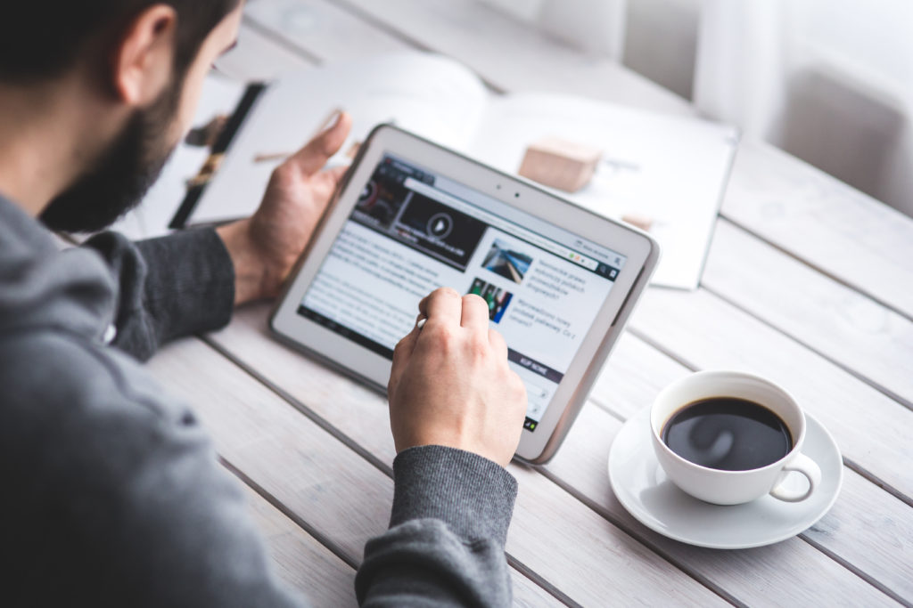 Person reading on tablet